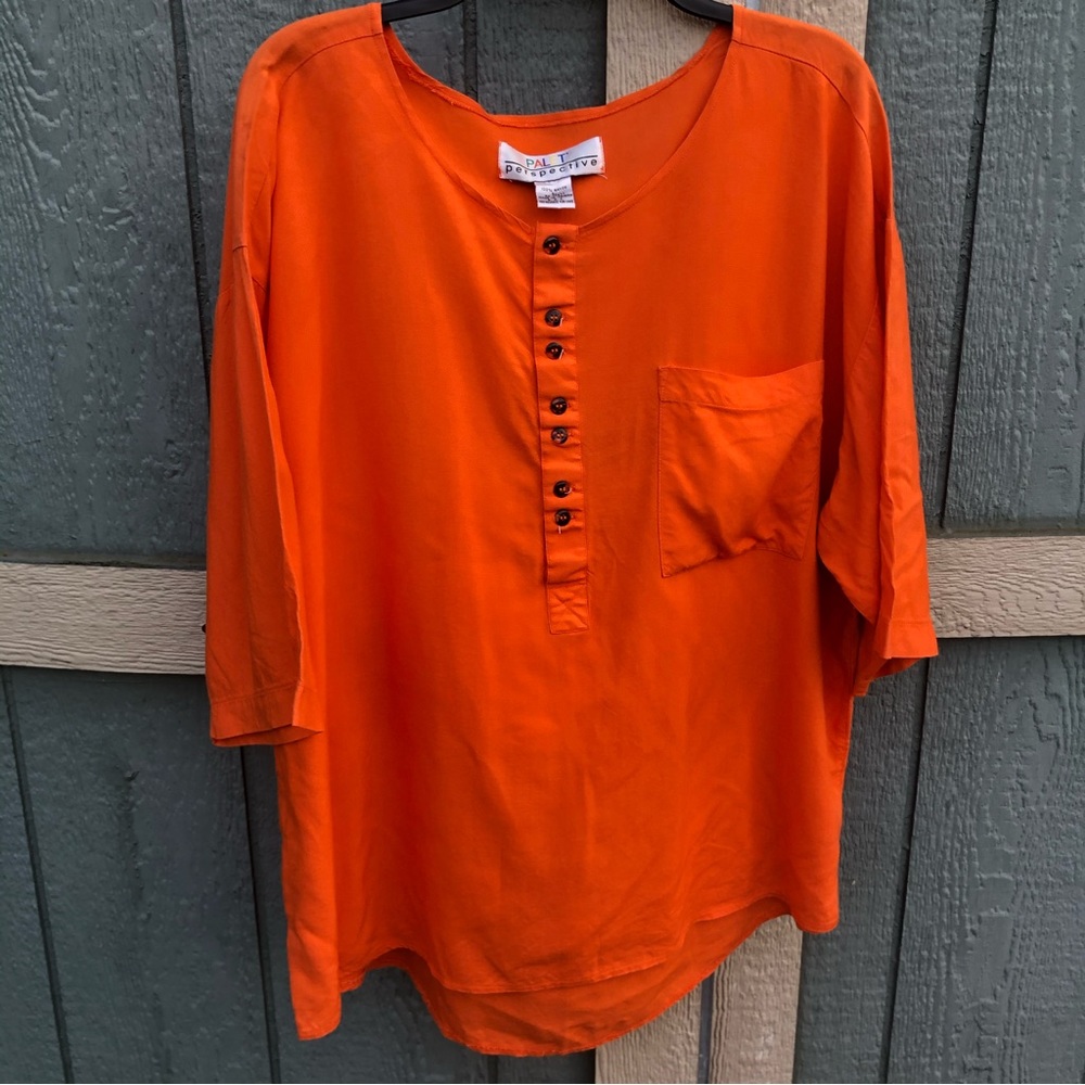 Size large women’s orange tunic top longer length